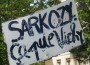 The sign read: " Sarkozy: It Stinks Like Vichy" photograph by Moacir