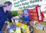 4d5626a7e394f.image Dan Parr of Happy Pharmer’s Phamily in Butte, Montana, checks the final count of 2,200 pounds of food and baby items donated to the Butte Emergency Food Bank in exchange for free marijuana.