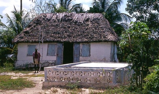 house on hill with priests tomb